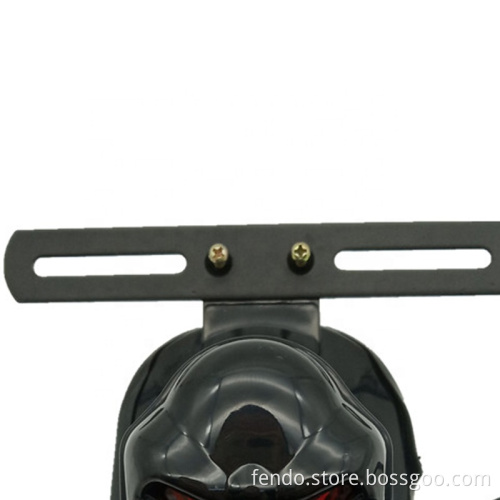 Red LED Skull Head Shaped Motorcycle DRL License Plate Lamp with Stop Brake Lights